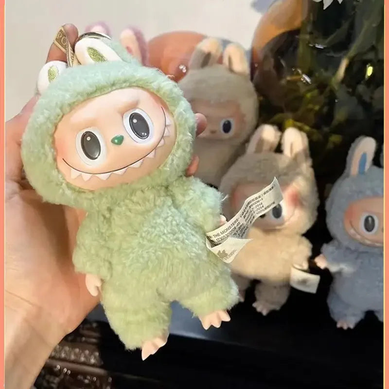 Labubu The Monster Vinyl Face Doll Heart Moving Macaron Doll Blind Box Blind Bag Figure Guessing Bag China High Quality Replica